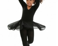 Beautiful African American girl ballerina spinning. Shot with Canon 20D.